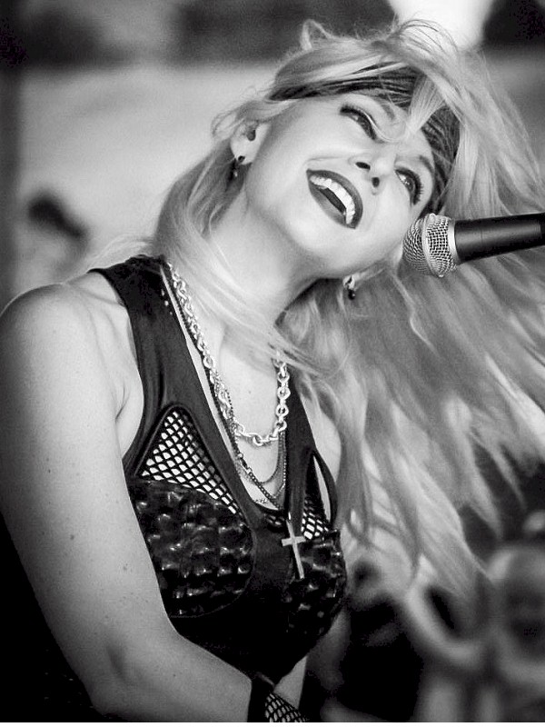 Amy LeRoy playing on stage