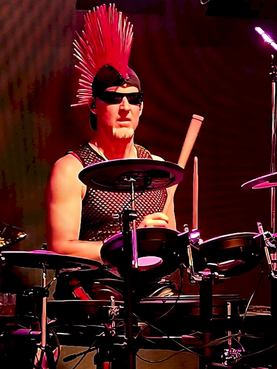 James Nelson playing drums