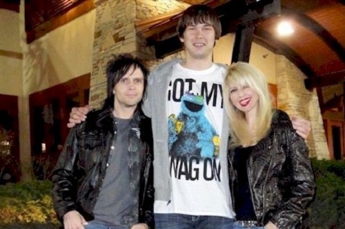 Amy and Travis with Kyrylo Fesenko